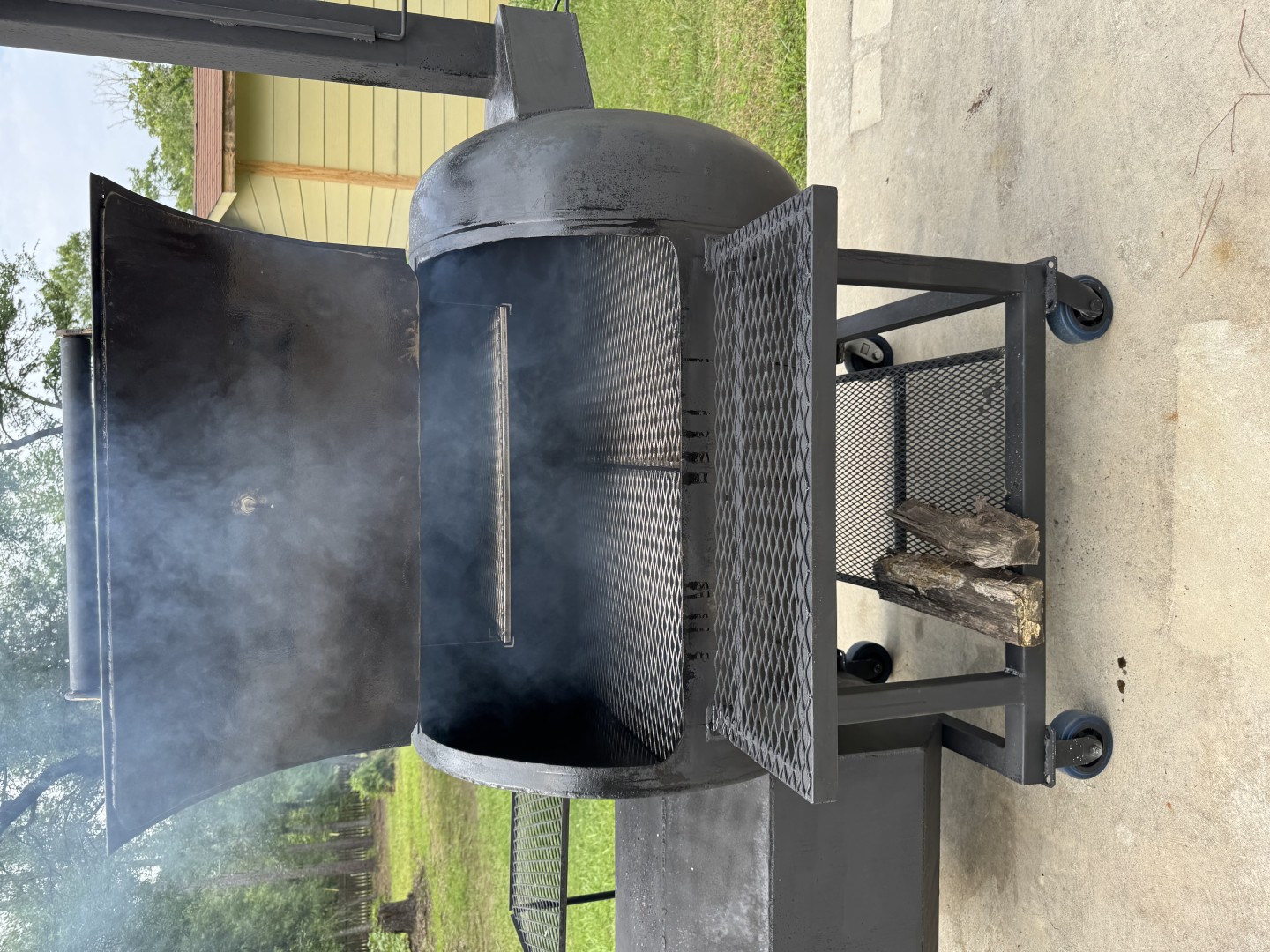 Buddy Reds Smokehouse cabinet smoker with real wood fire